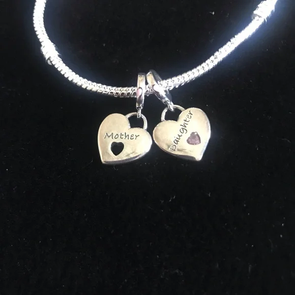 Sterling silver charm bracelet with 2 charms - Picture 2 of 2